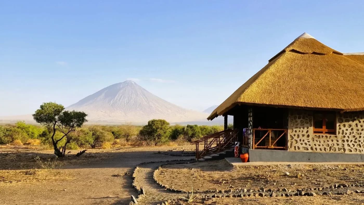 A thatched bungalow facing the volcano