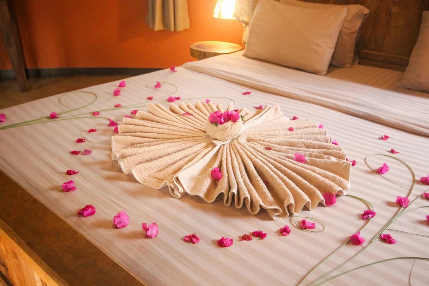Banda bungalow bedroom with a canopy bed