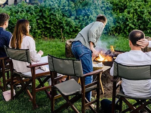 Guests round the evening fire
