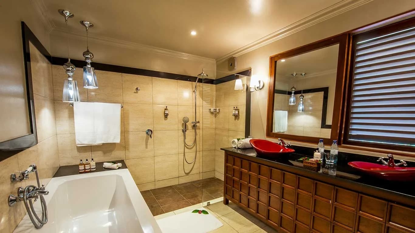 Bathroom with a bath and shower