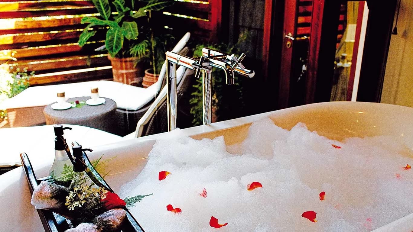 A bath drawn with rose petals