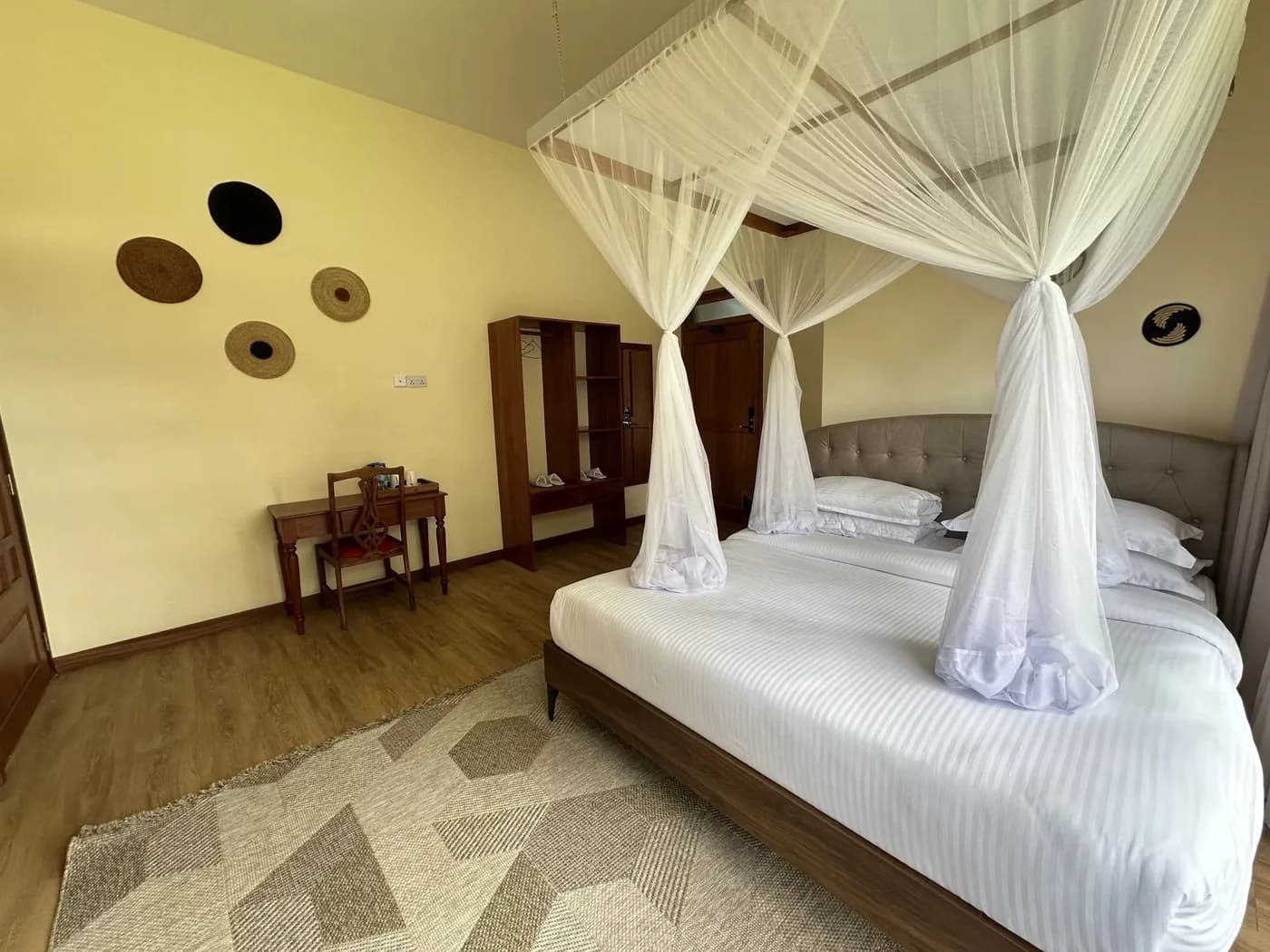 Room with a canopied bed