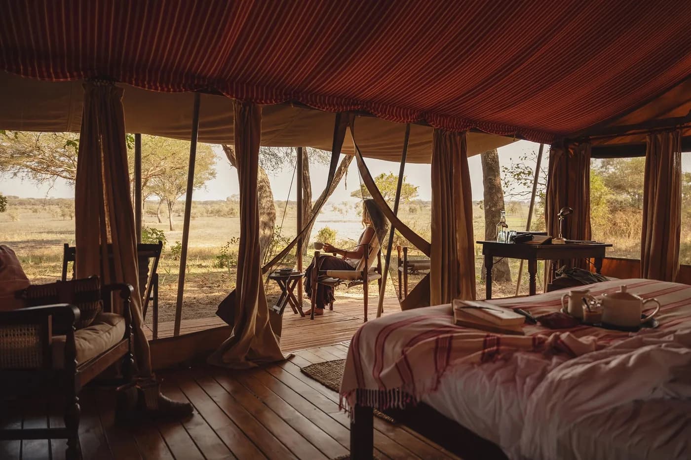 Bed and hammock looking out from the tent