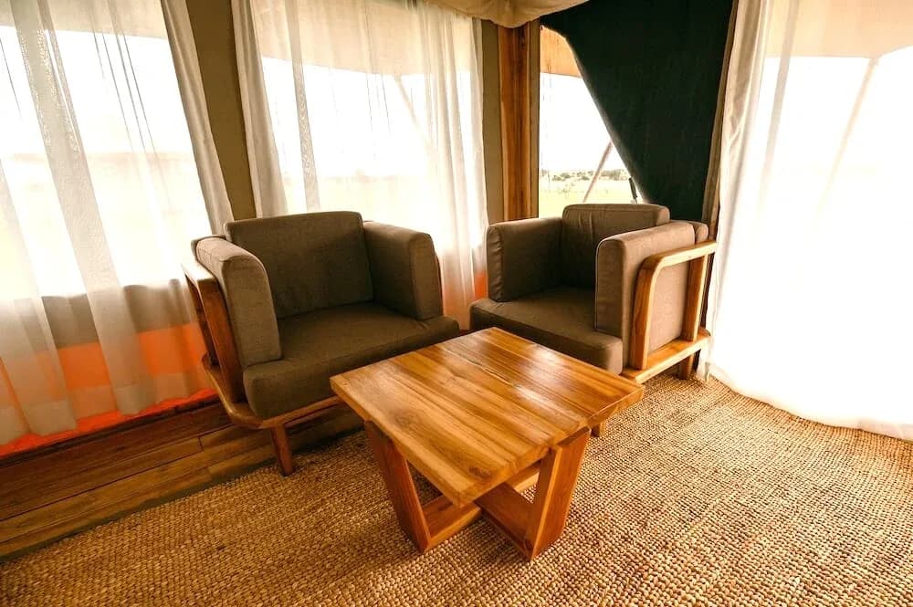 Armchairs by the tent windows