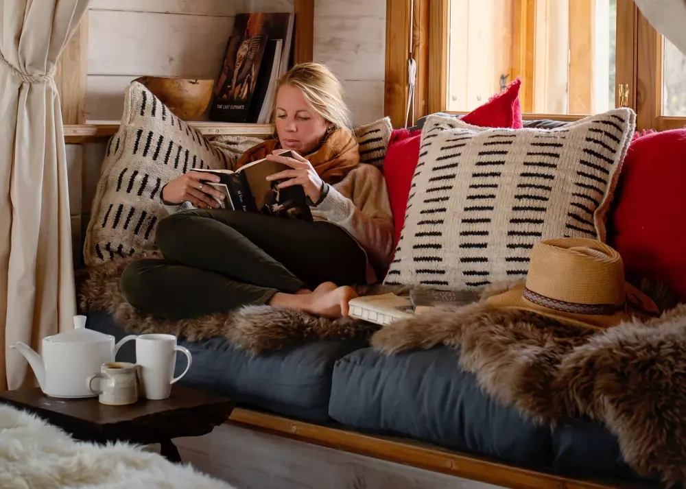 Reading on the lounge sofa