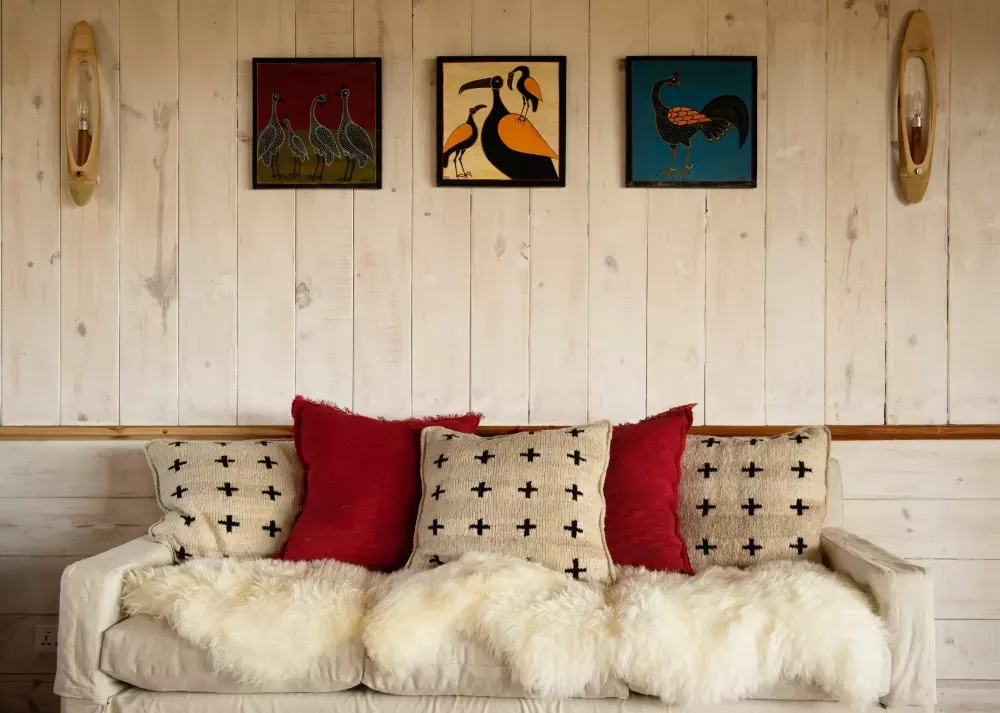 Bench beneath the bird prints