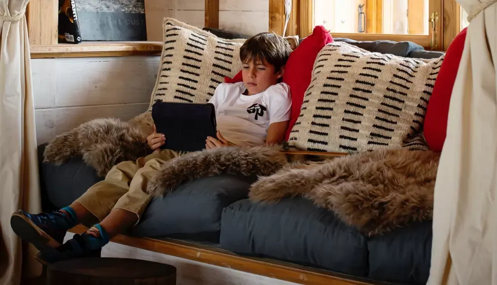 Child on the lounge sofa