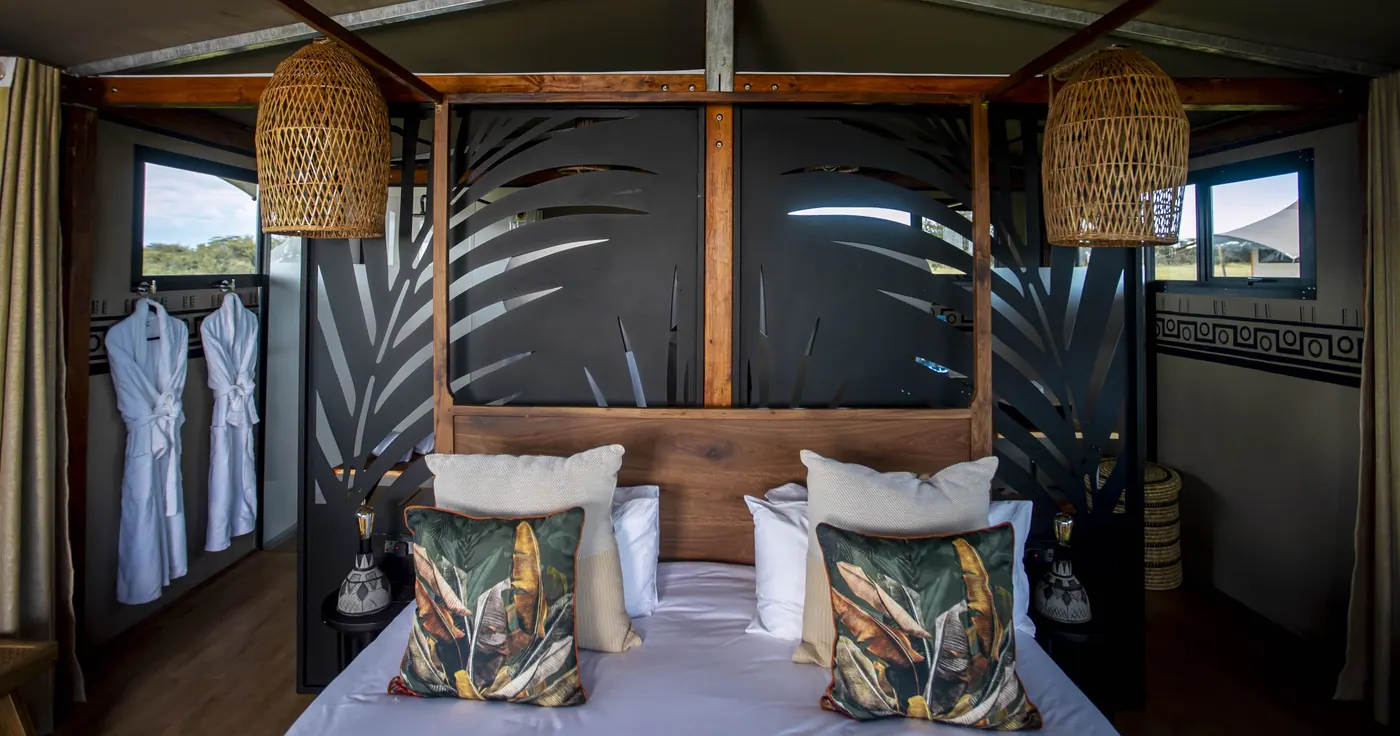 Twin beds with printed cushions