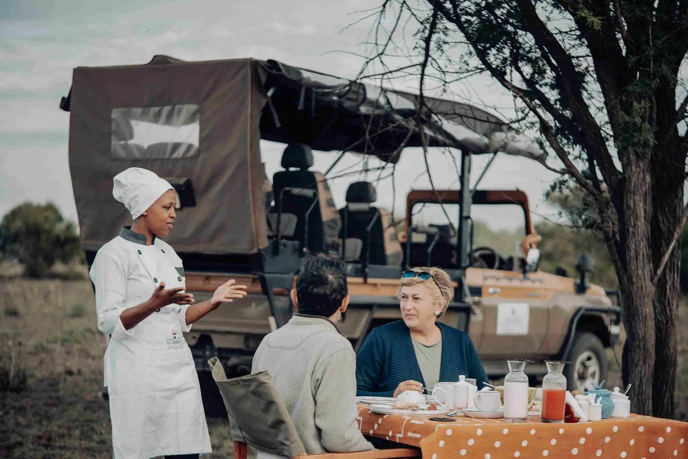 Chef serving in the bush