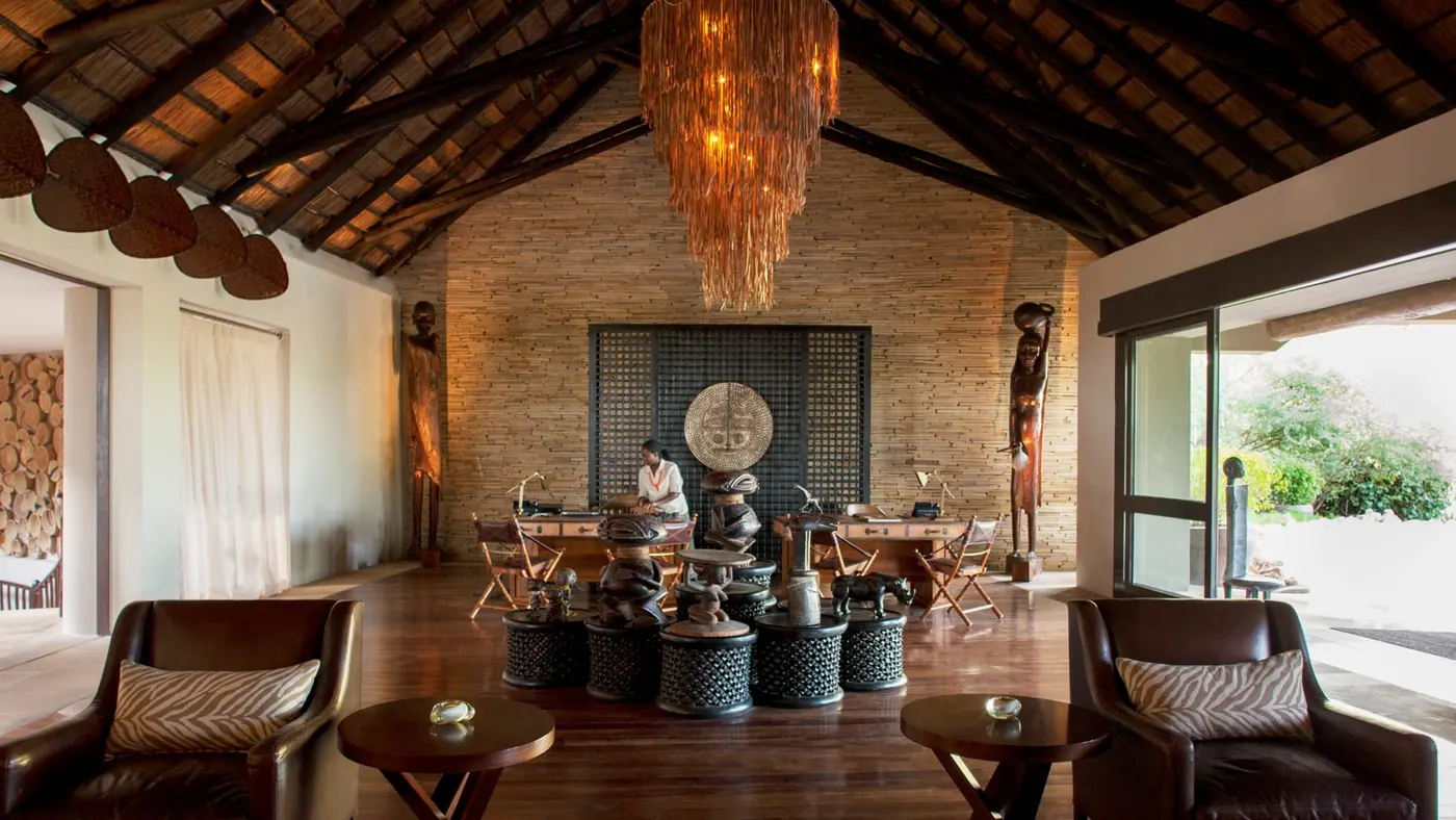 Main lounge beneath a vaulted thatch roof
