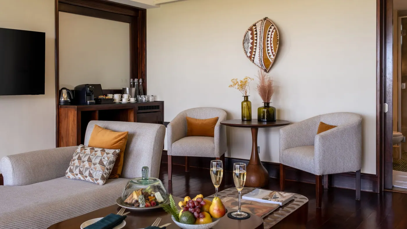 Suite sitting area set with champagne