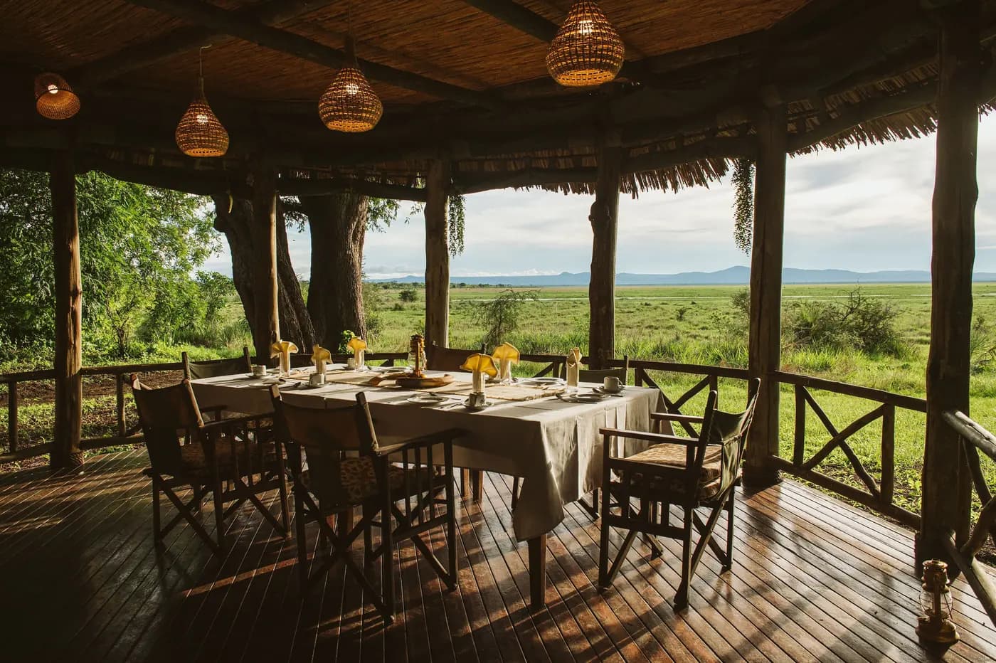 Tables set on the open deck above the plain