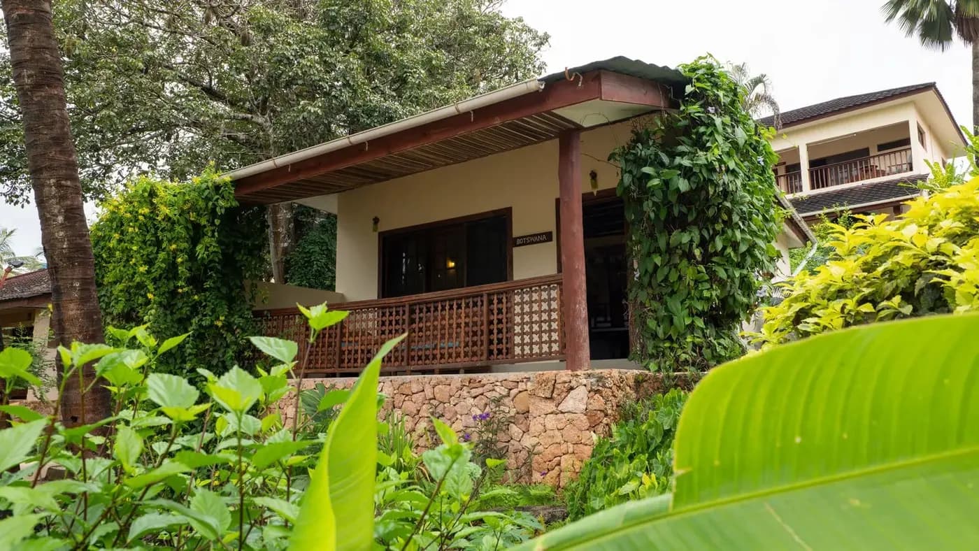 A Coral Stone Bungalow in the gardens