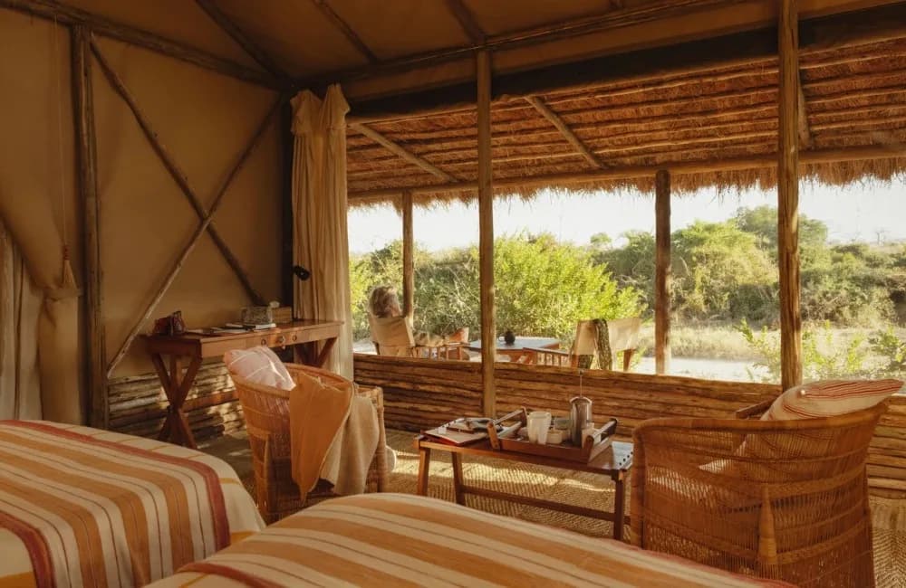 Tent with twin beds and a desk