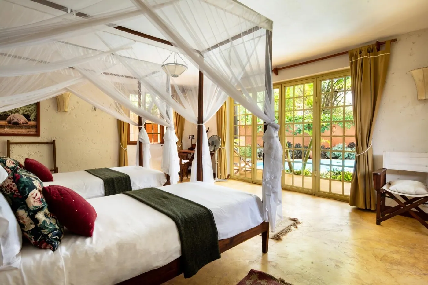 Four-poster bed with garden doors