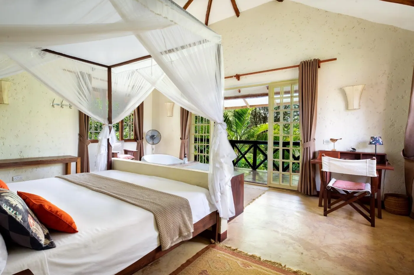 Twin beds under mosquito nets