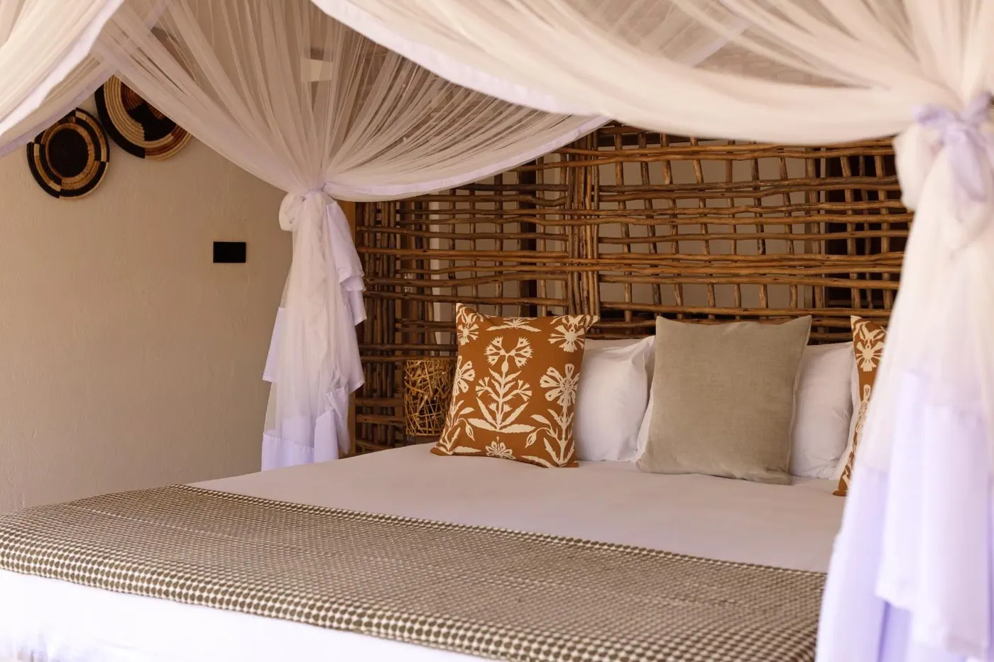 Bed with a woven headboard