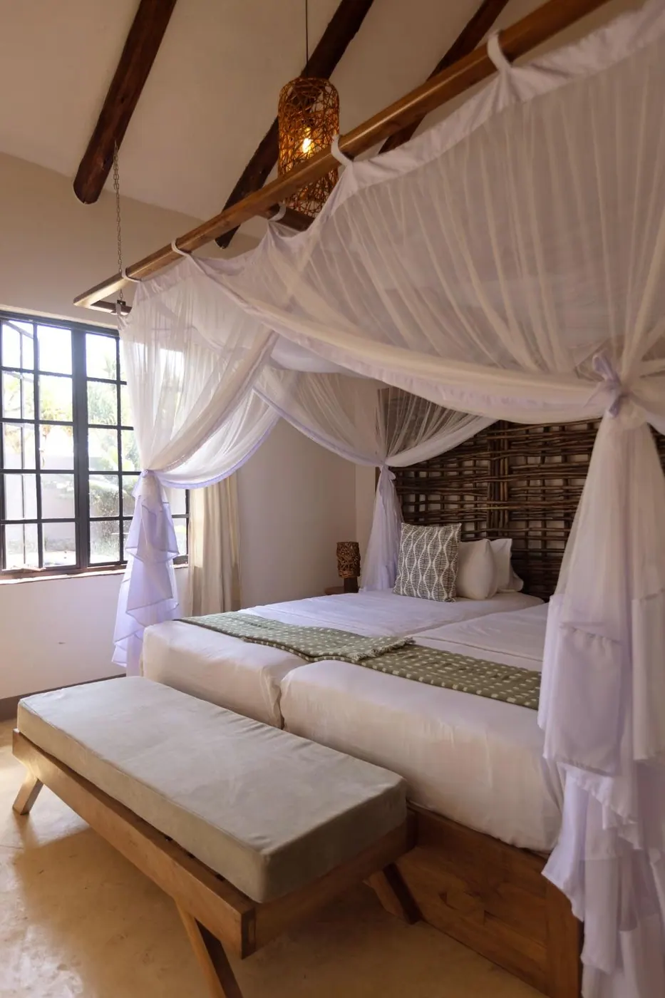 Twin beds under the vaulted roof