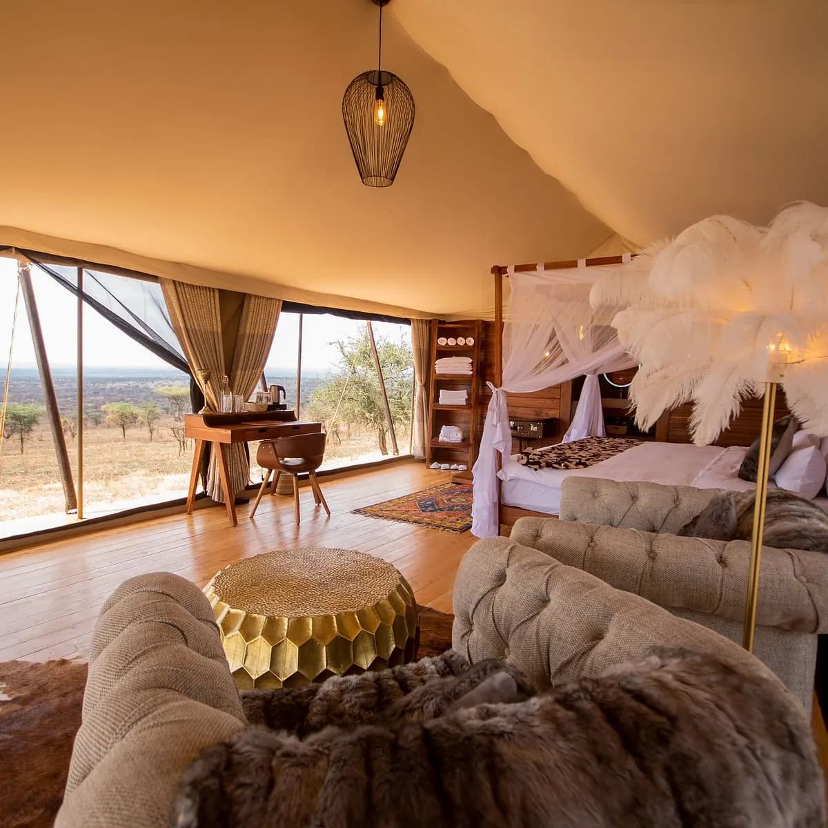 Tent interior with fur throw