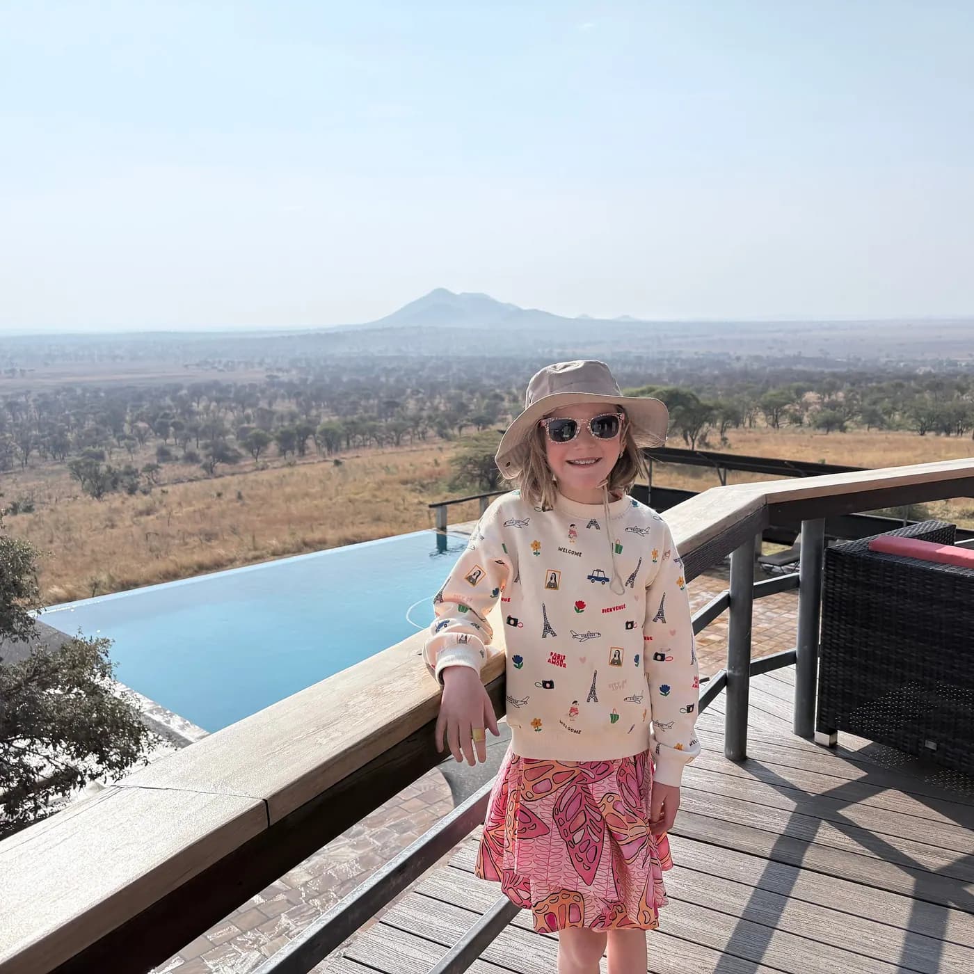 By the pool, mountain beyond