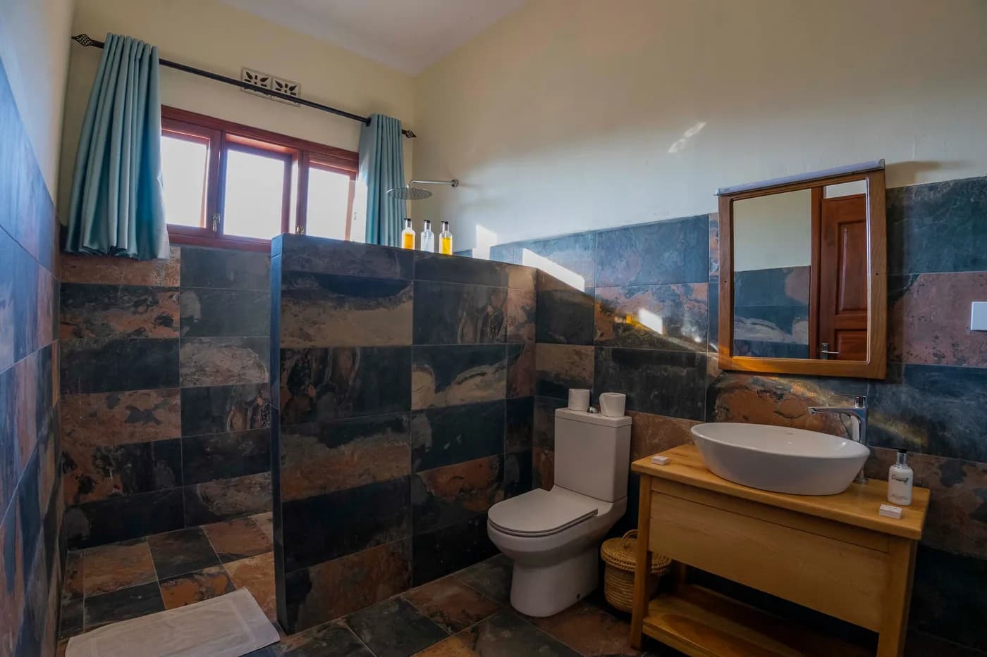 Stone-tiled bathroom