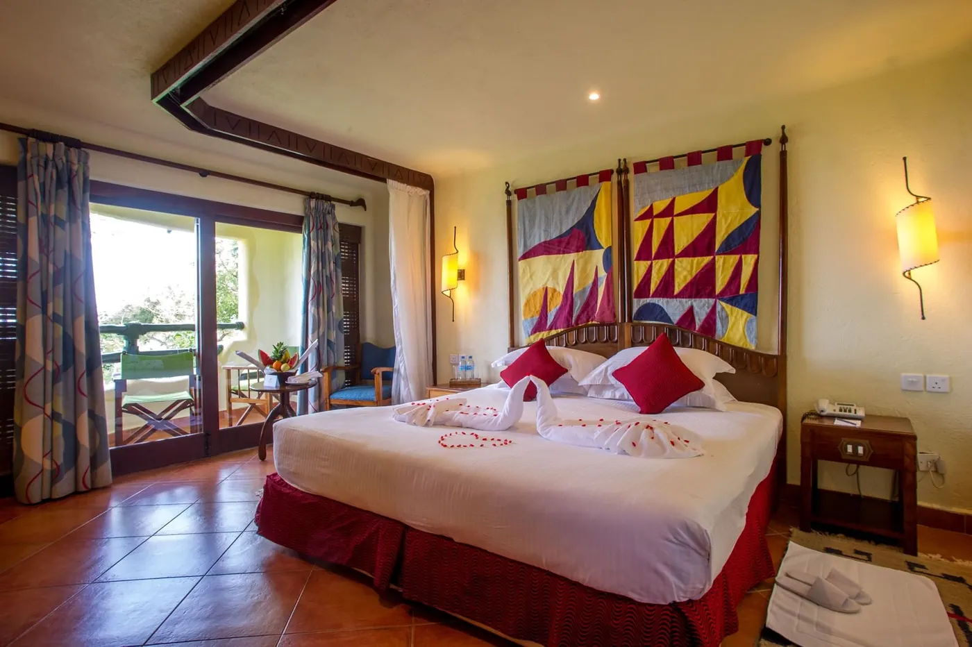 Bed with a painted hanging above