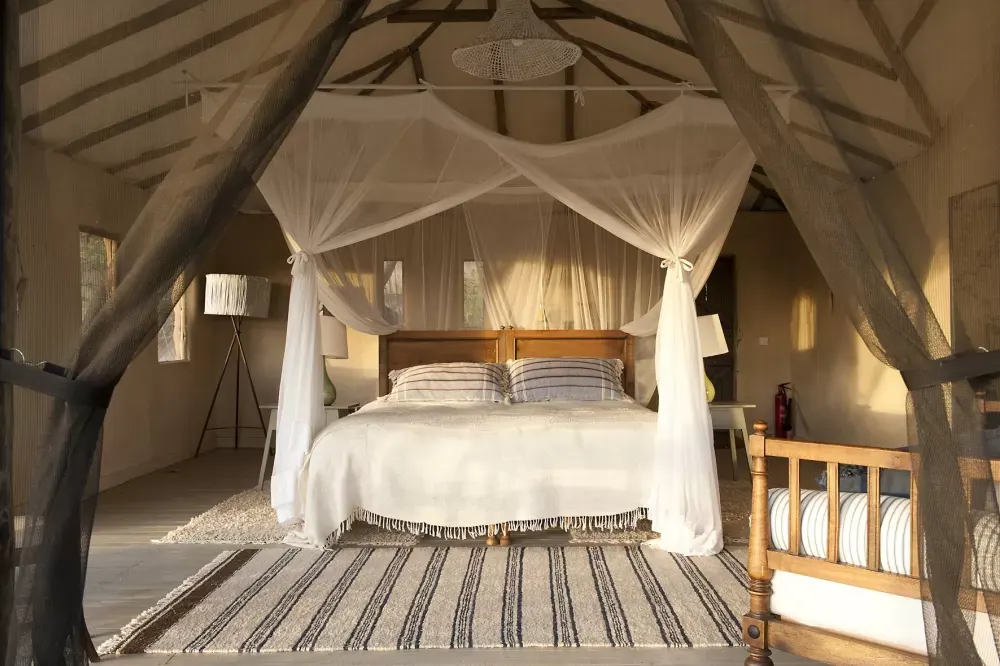Canopied bed in the suite