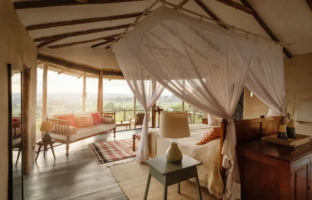 Bed with the plains beyond