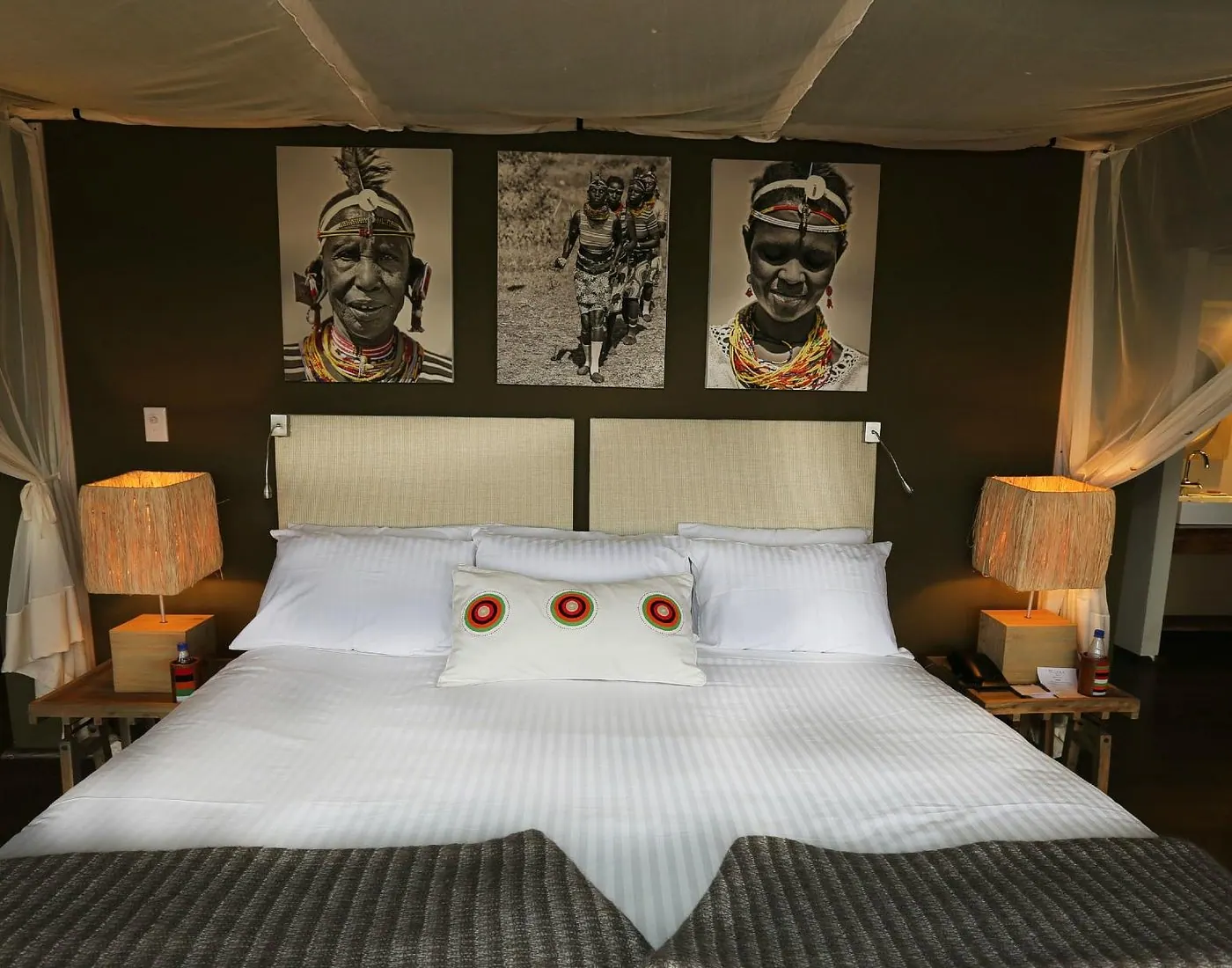 Twin room with portrait prints