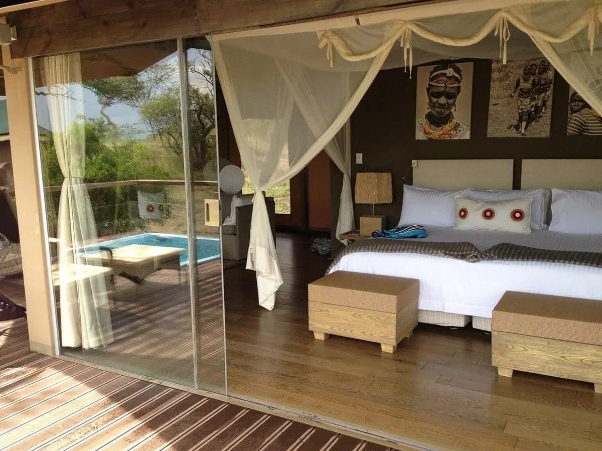 Bed with the drapes drawn back