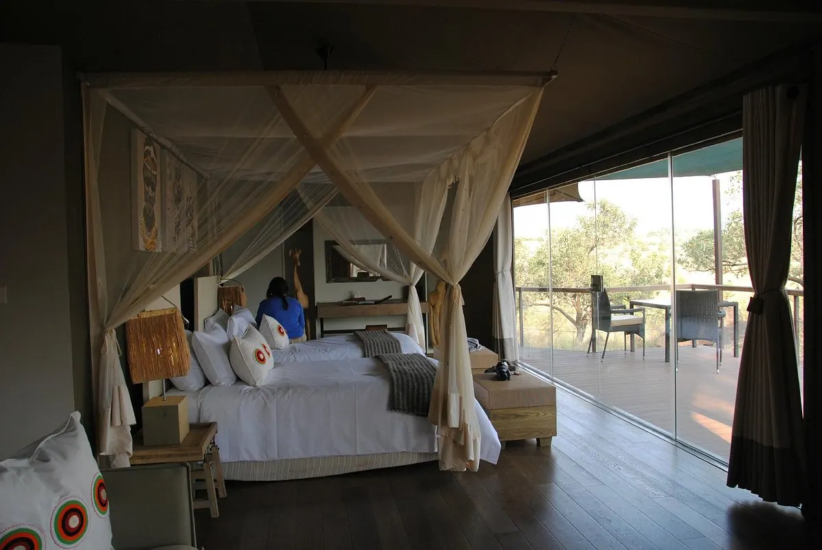 Bed with the deck door open