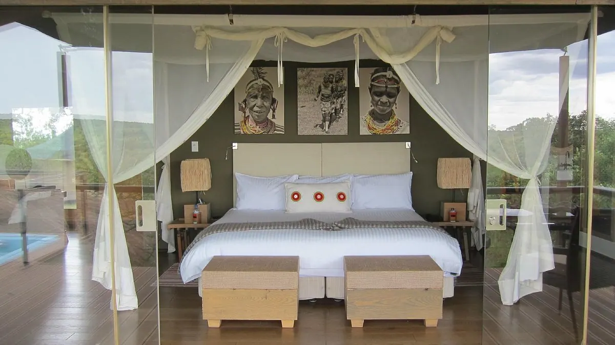 Twin beds in the tented suite