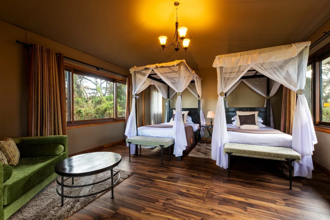 Twin room with canopied beds