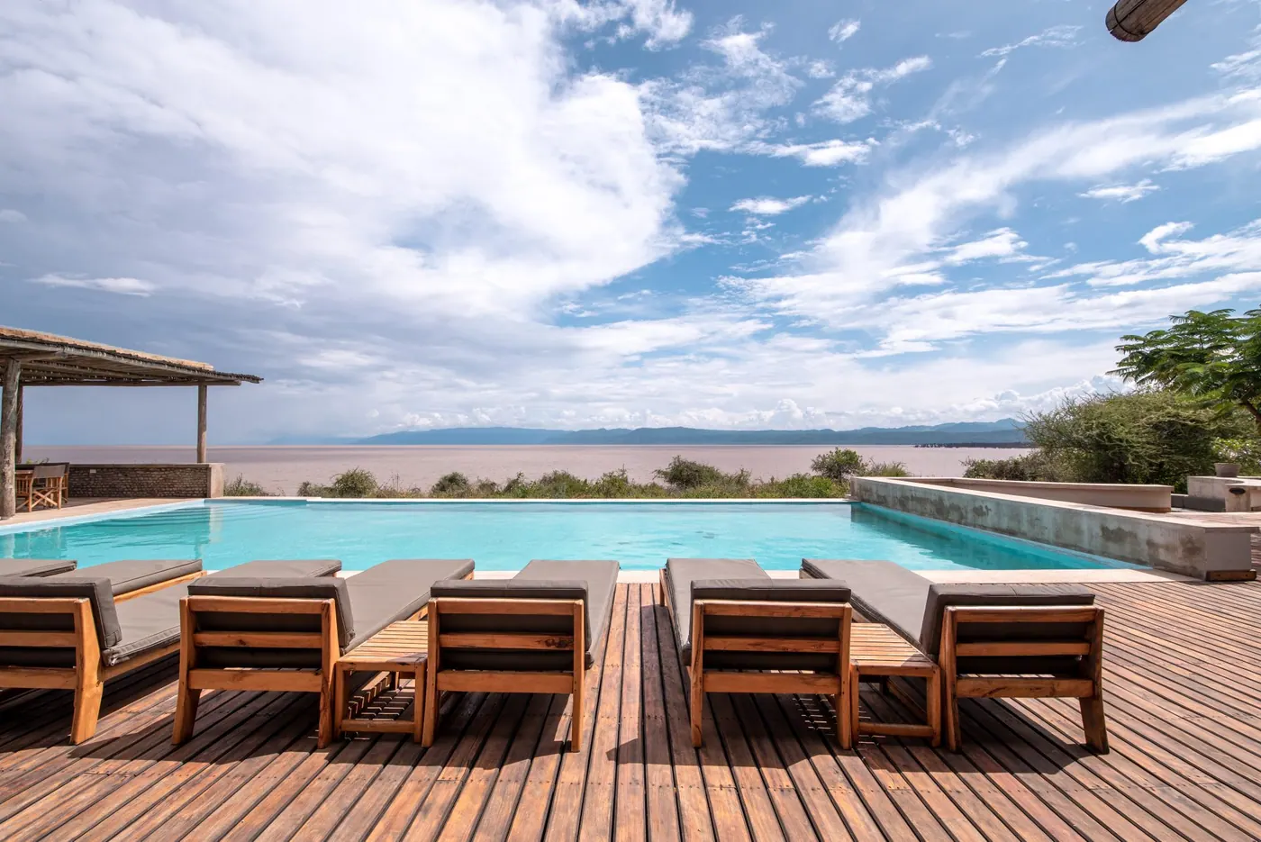 Loungers on the deck above the lake