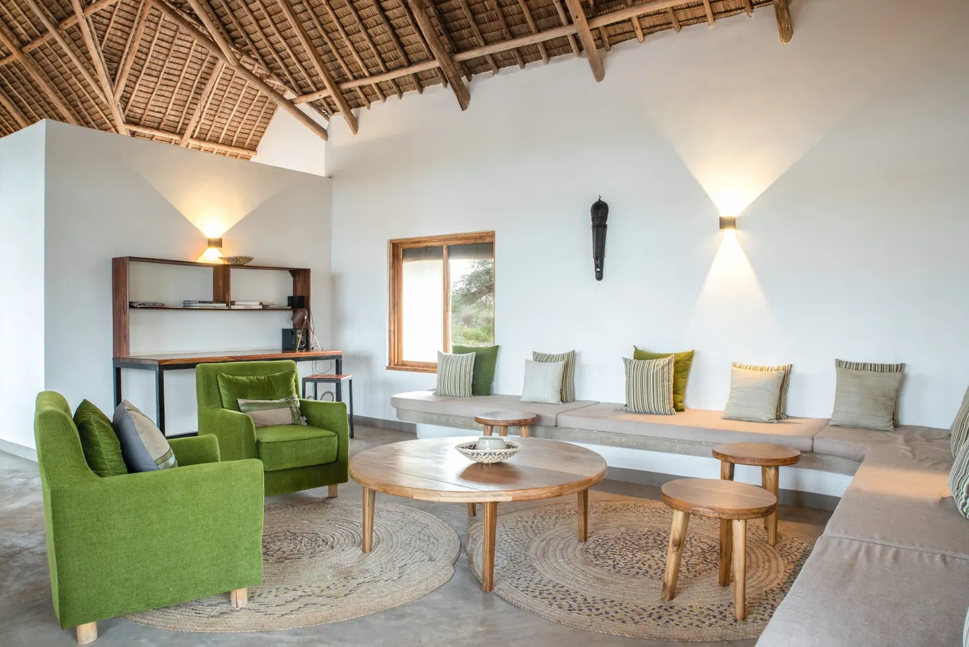 Lounge with green armchairs