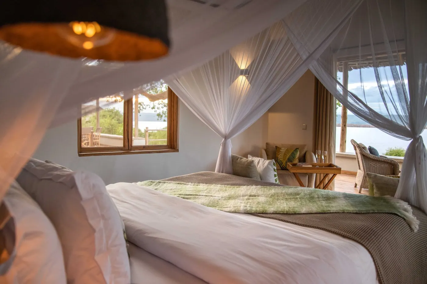 Bed under a mosquito net