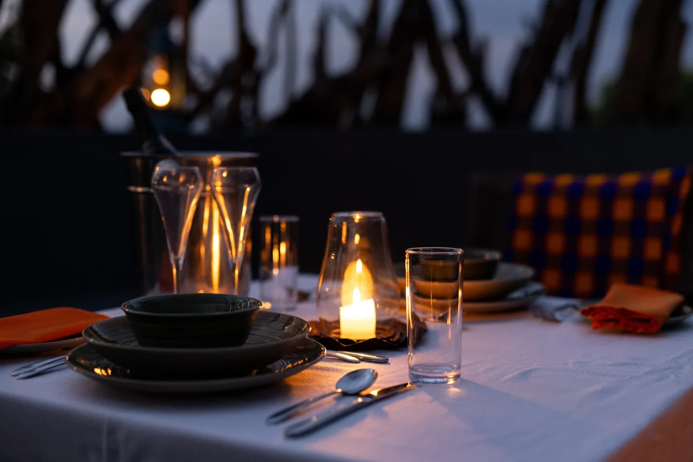 Candle-lit table at dusk