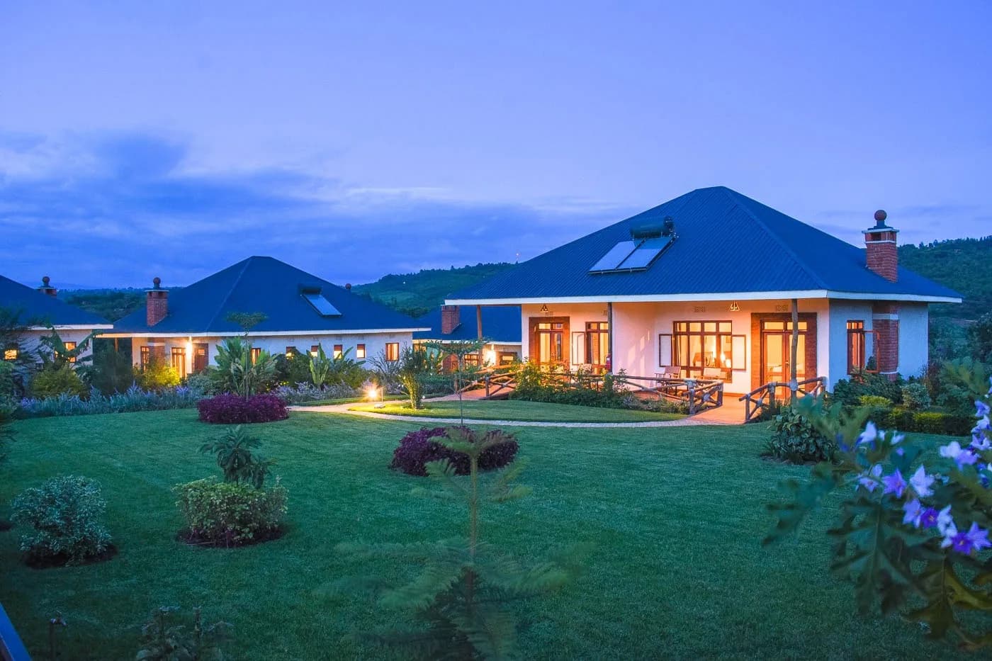 Cottage and gardens at dusk