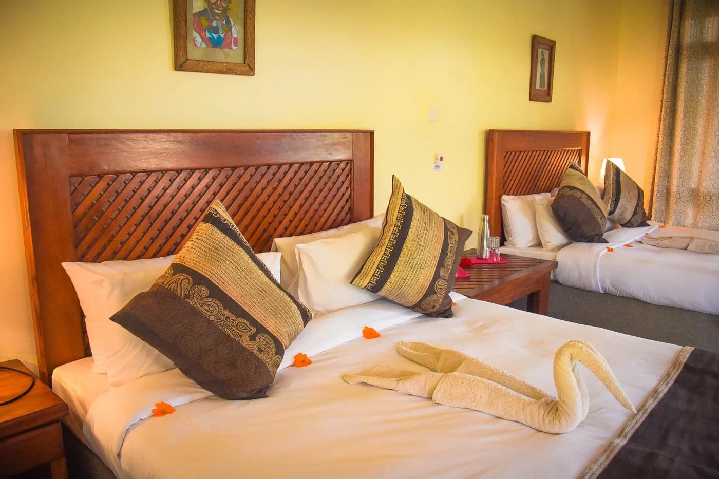 Room with a carved headboard