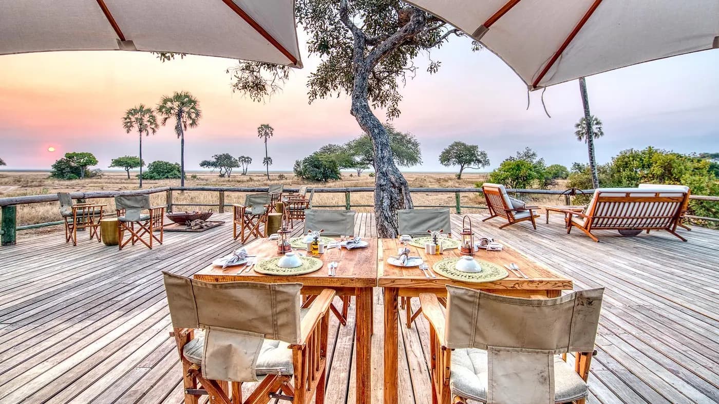 Tables set on the deck under umbrellas