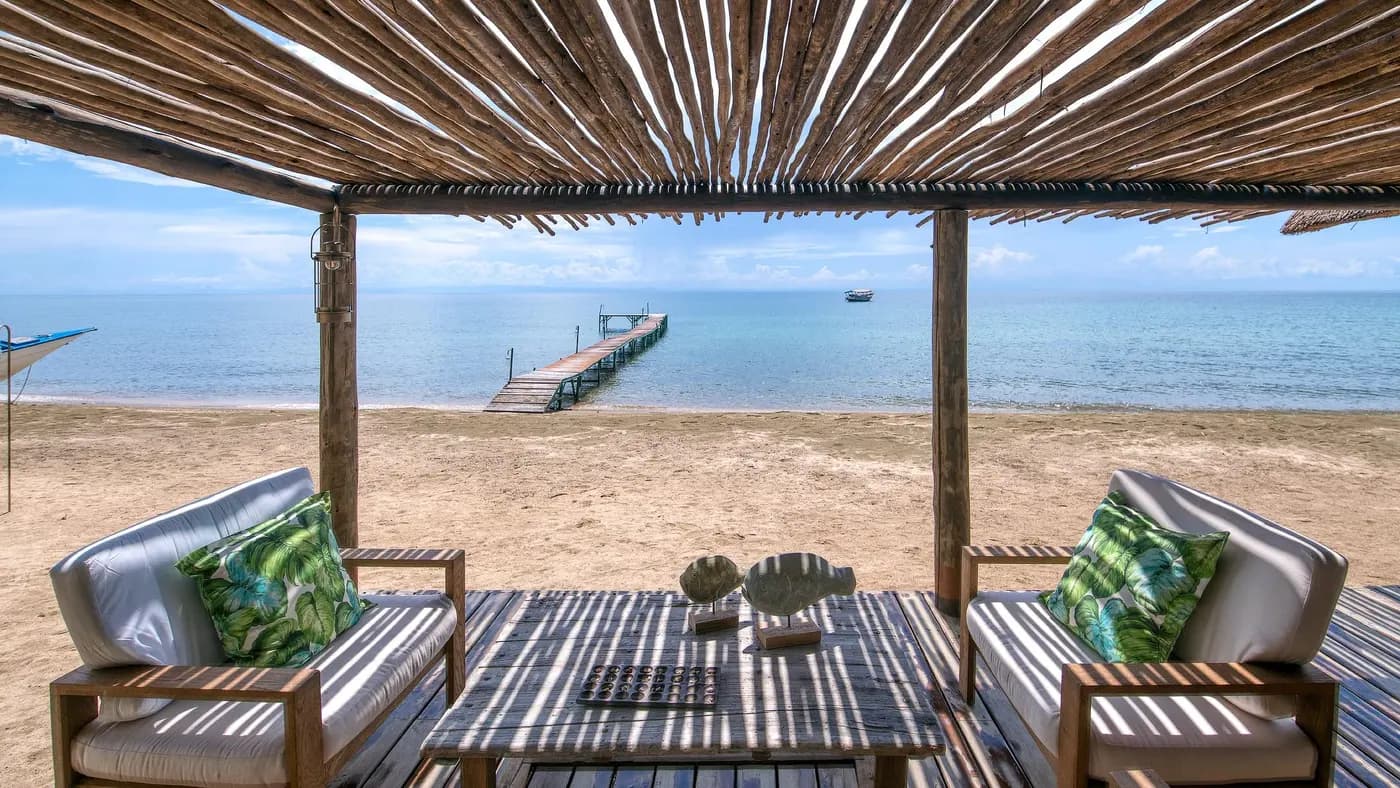 Shaded beach deck facing the jetty