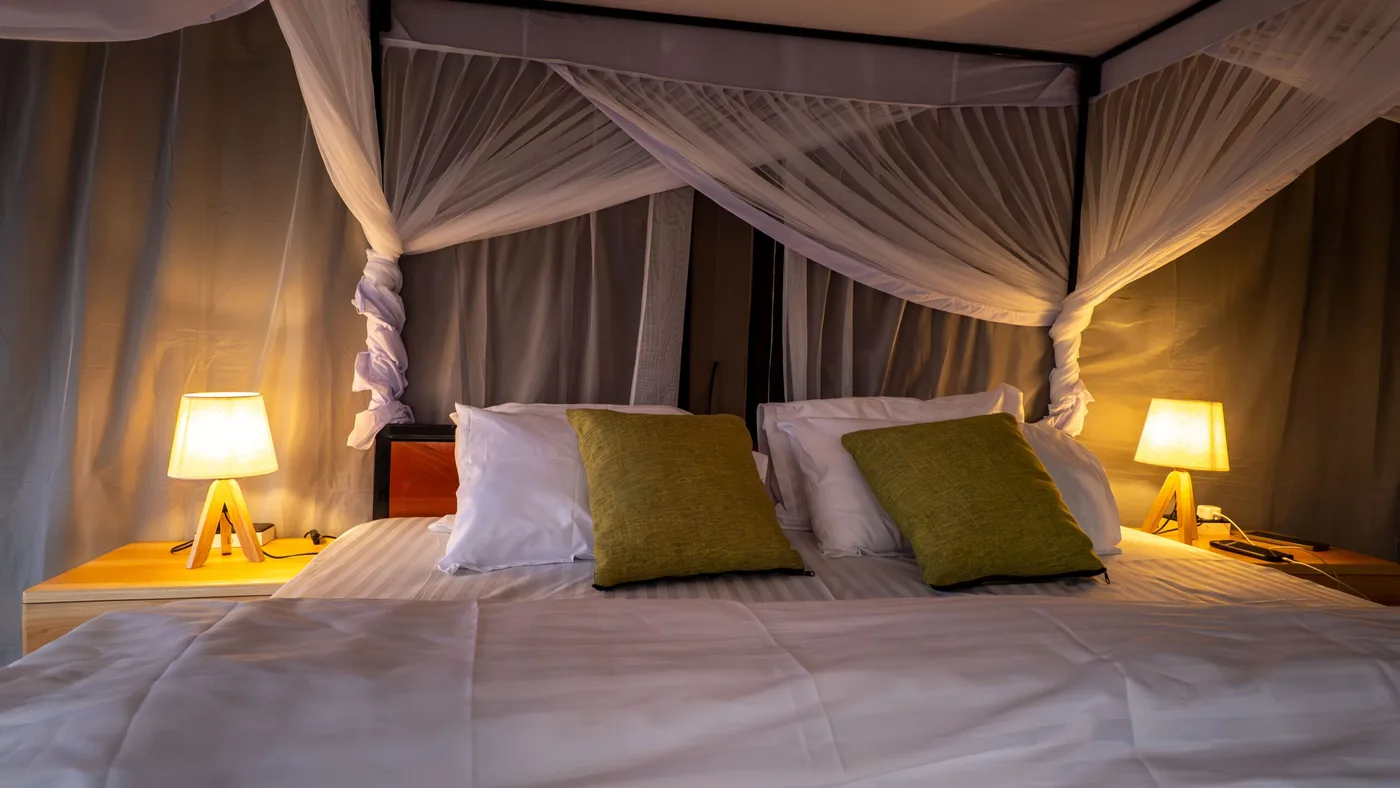 Bed with green cushions