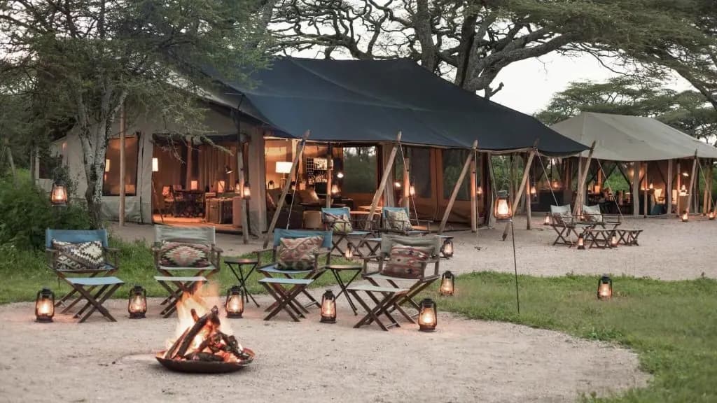 The camp lit at dusk