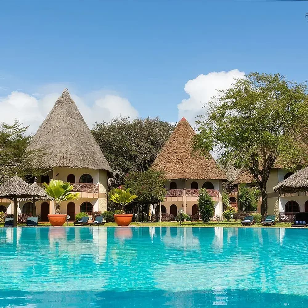 Pool among the thatched cottages