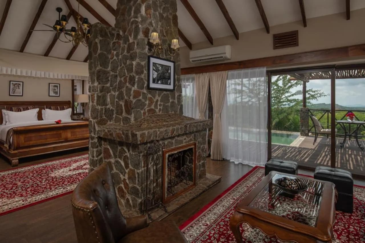 Suite with a stone fireplace