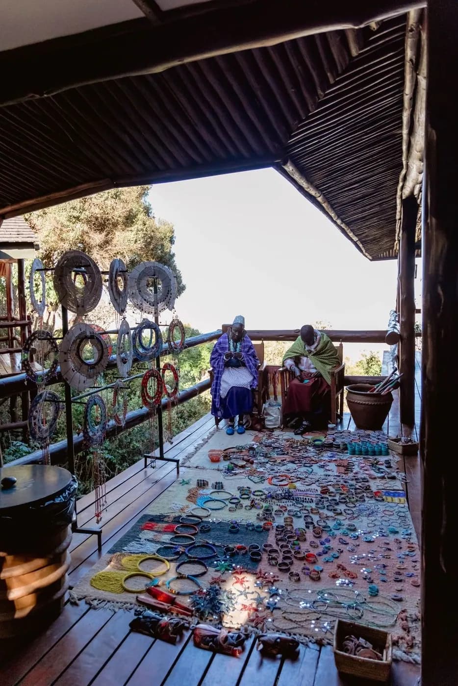 Maasai crafts laid out on the terrace