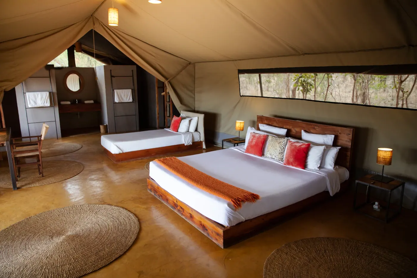Bed with orange cushions