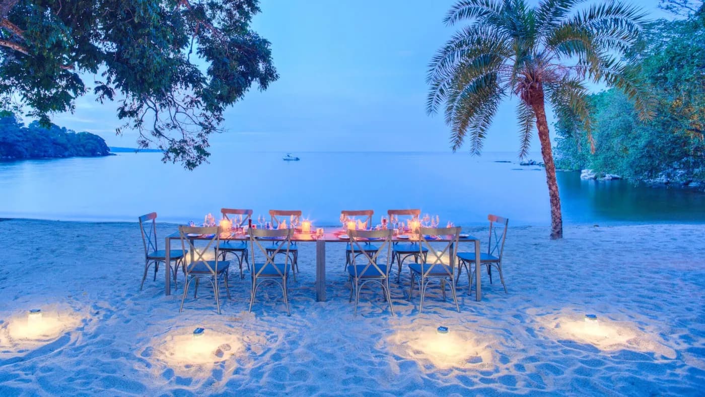 Dinner laid out on the beach at night