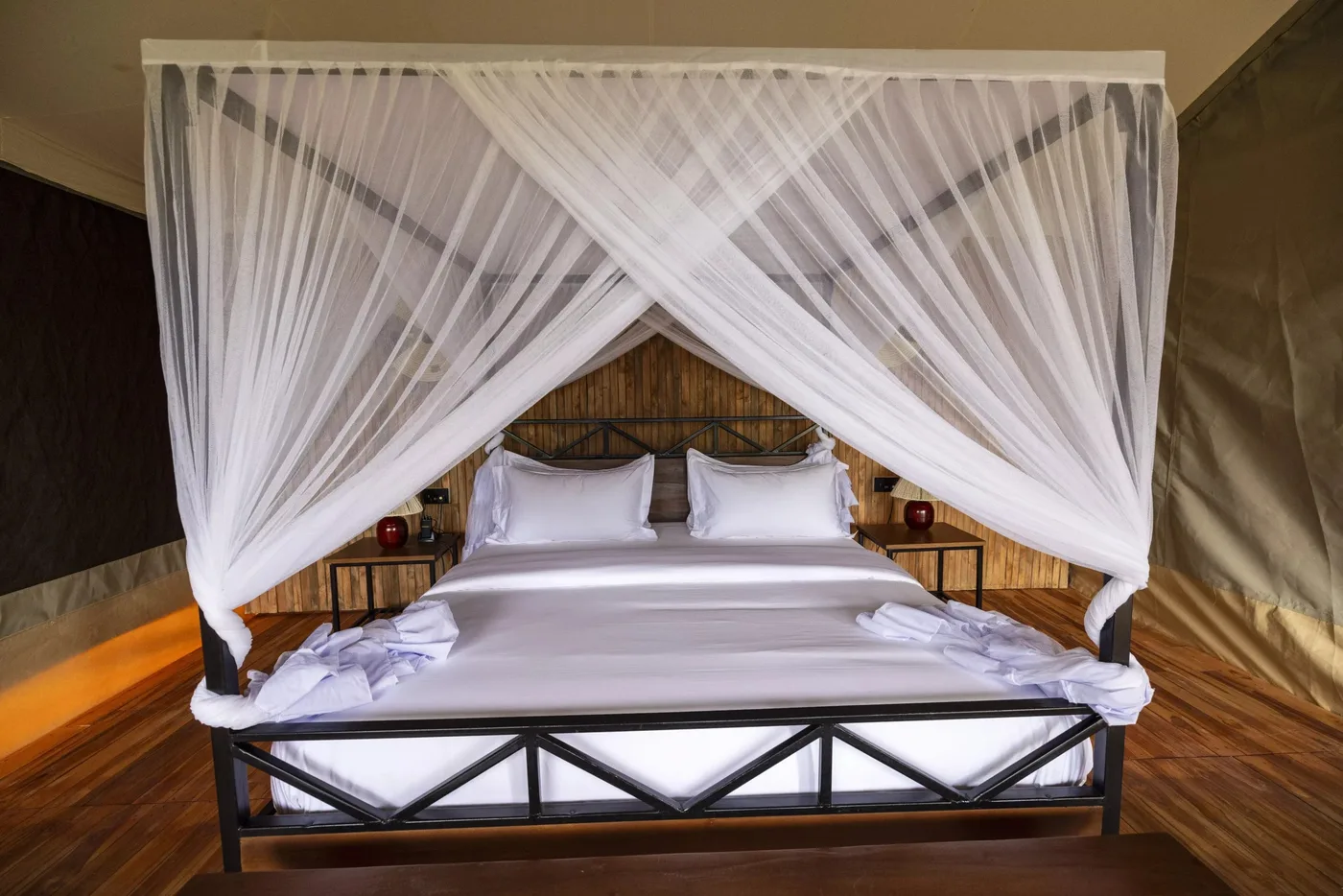 Double bed under a mosquito net