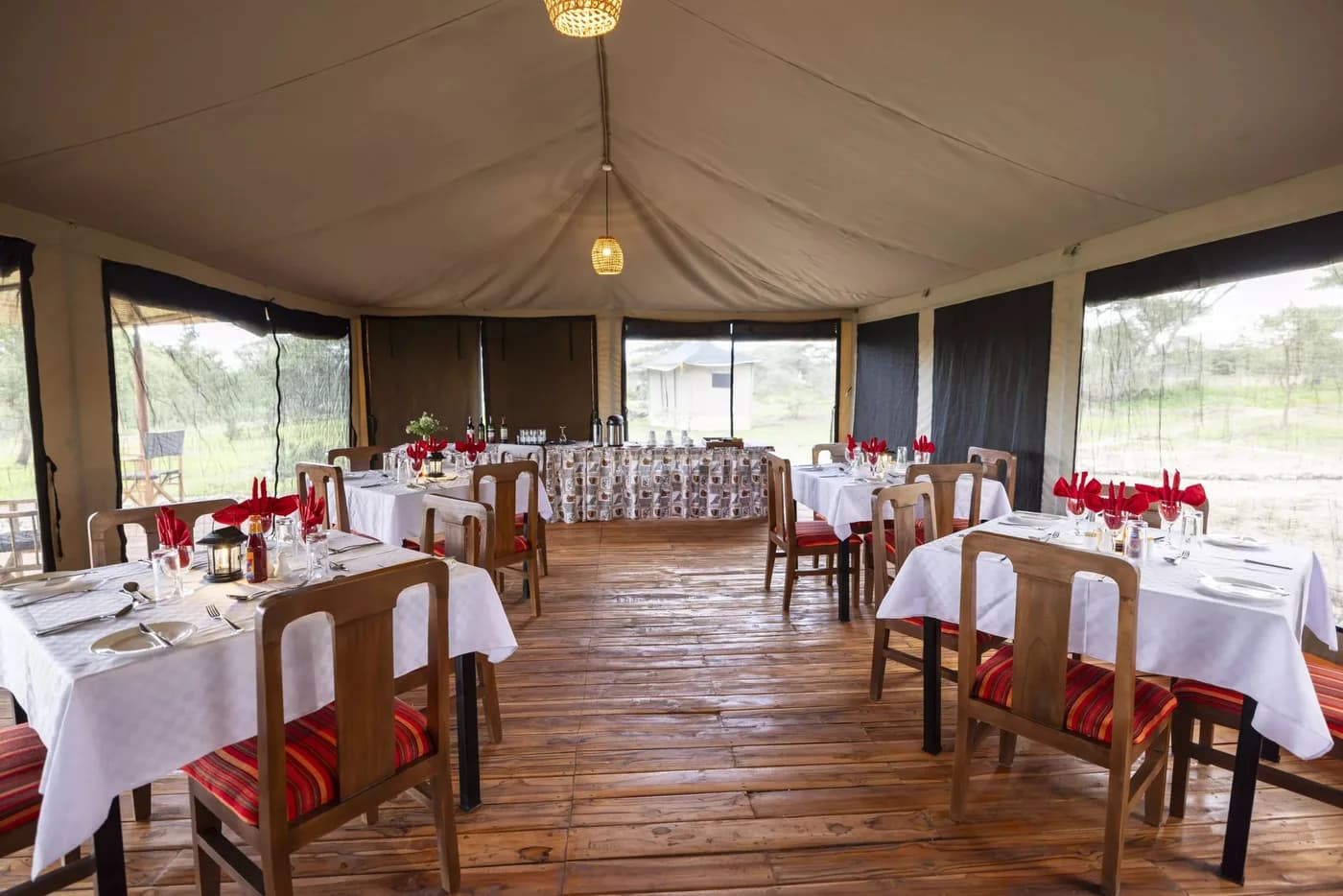 Tables laid in the dining tent